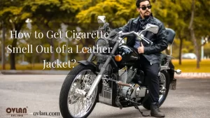A man in a leather jacket sitting on a motorcycle in an outdoor setting, with the text "How to Get Cigarette Smell Out of a Leather Jacket?" displayed above.
