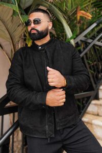 A hoodie with CE Level 1 armor pads on the back, shoulders, and elbows. The image shows the armor pieces in yellow, highlighting their safety features.